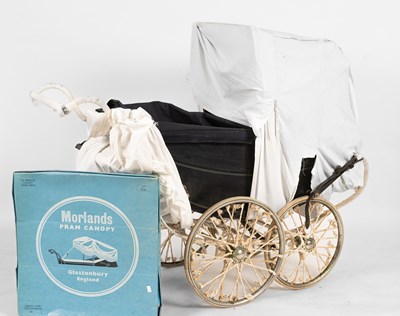 Lot 437 - A Silver Cross pram
