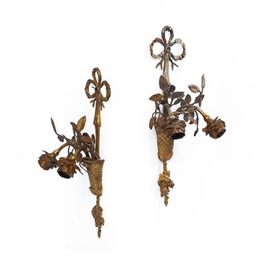 Lot 558 - A pair of gilt metal wall sconces
