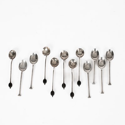 Lot 69 - A set of six silver seal top coffee spoons