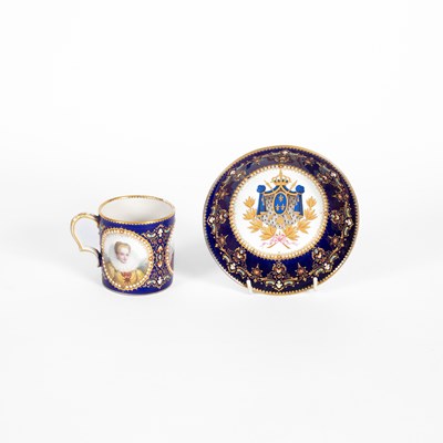 Lot 391 - A Sèvres style blue ground jewelled cabinet cup and saucer