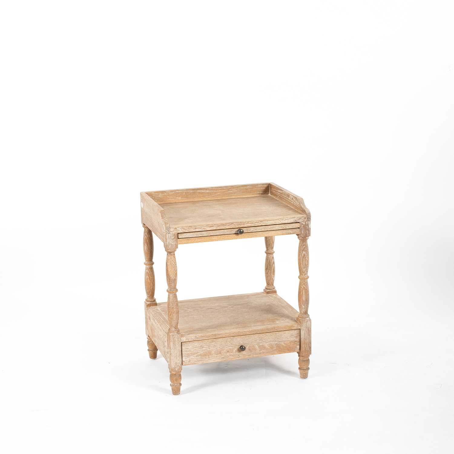 Lot 5 - A limed oak bedside table