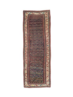 Lot 310 - A Kazak runner