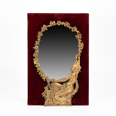 Lot 228 - An early 20th Century mirror