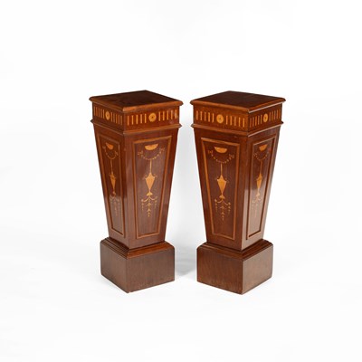 Lot 166 - A pair of inlaid mahogany pedestal stands