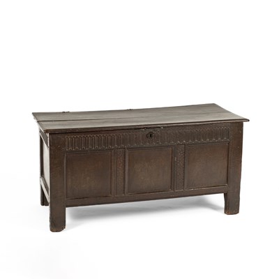 Lot 27 - An oak panelled chest