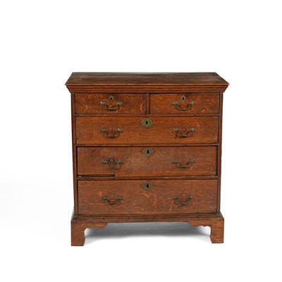 Lot 85 - A George III oak chest