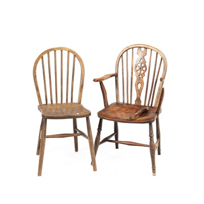 Lot 61 - A 19th Century yew and elm Windsor arm chair