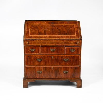Lot 47 - An early 18th Century walnut and featherbanded bureau