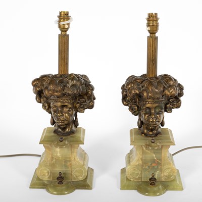 Lot 206 - A pair of 20th Century onyx and brass table lamps