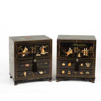 Lot 160 - A pair of chinoiserie black lacquered cabinets