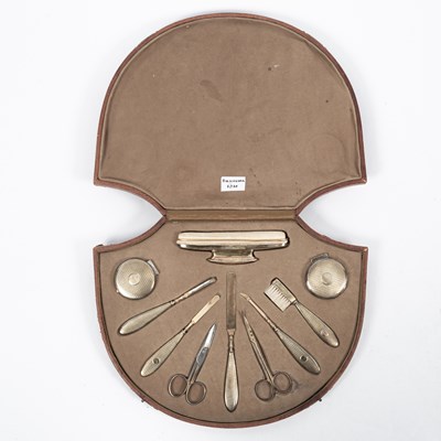 Lot 14 - A silver gilt manicure set