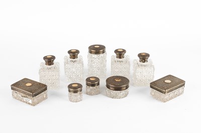 Lot 15 - A quantity of Victorian silver-lidded dressing table items