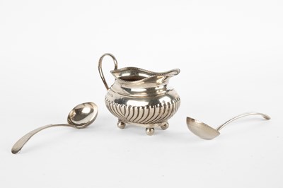 Lot 18 - An Edwardian silver jug