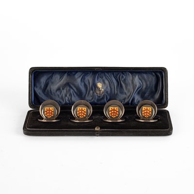Lot 20 - A set of four Edwardian silver and enamel menu holders