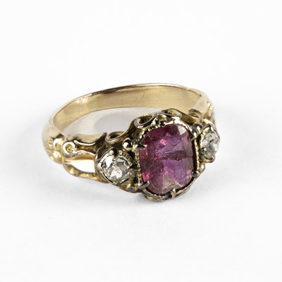 Lot 250 - A 19th Century yellow metal ruby and diamond three-tone ring