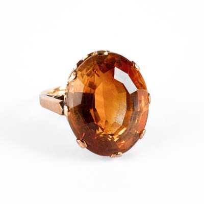 Lot 262 - A mid Century yellow metal and citrine dress ring