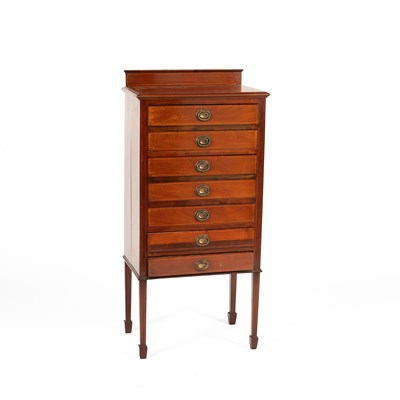 Lot 269 - An Edwardian mahogany music cabinet or chest