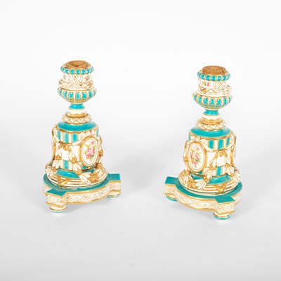Lot 494 - A pair of Minton candlesticks