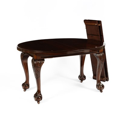 Lot 173 - A Chippendale revival mahogany oval extending dining table