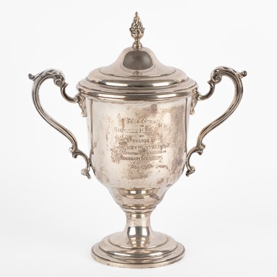 Lot A silver two-handled trophy cup and cover