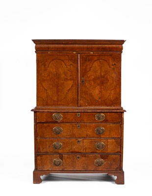 Lot 38 - A Queen Anne walnut and featherbanded cabinet on chest
