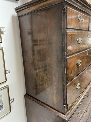 Lot 84 - A George II walnut and featherbanded chest on chest