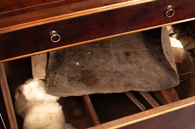 Lot 183 - A George III apothecary’s mahogany cabinet
