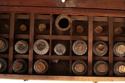 Lot 183 - A George III apothecary’s mahogany cabinet