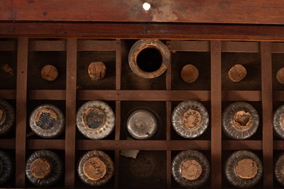 Lot 183 - A George III apothecary’s mahogany cabinet
