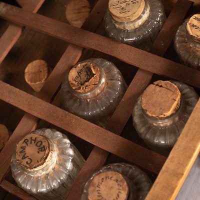 Lot 183 - A George III apothecary’s mahogany cabinet