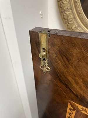 Lot 45 - A 17th Century walnut seaweed marquetry cabinet