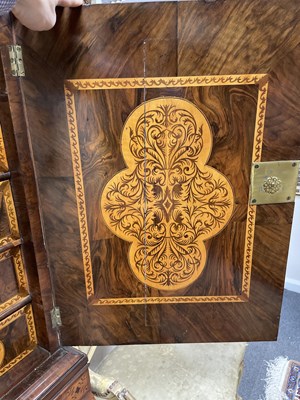 Lot 45 - A 17th Century walnut seaweed marquetry cabinet