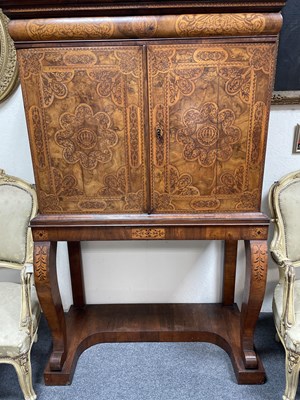 Lot 45 - A 17th Century walnut seaweed marquetry cabinet