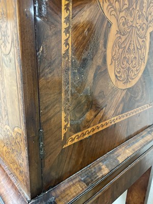 Lot 45 - A 17th Century walnut seaweed marquetry cabinet