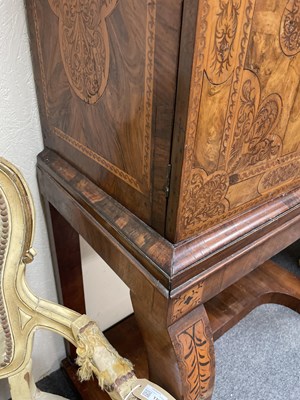 Lot 45 - A 17th Century walnut seaweed marquetry cabinet