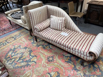Lot 186 - A pair of late Regency upholstered sofas