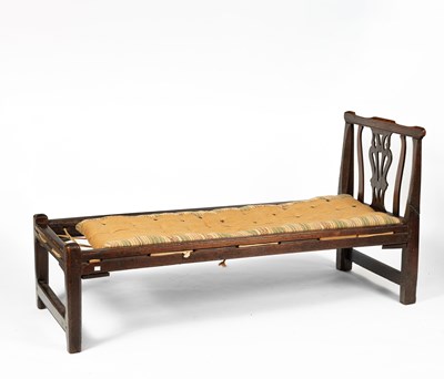 Lot 87 - An 18th Century provincial splat chair-back daybed