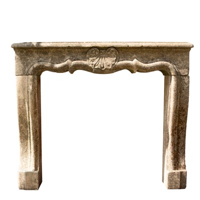 Lot 10 - A limestone fire surround or chimneypiece