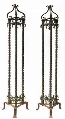 Lot 11 - A large pair of 19th Century wrought iron lamp stands
