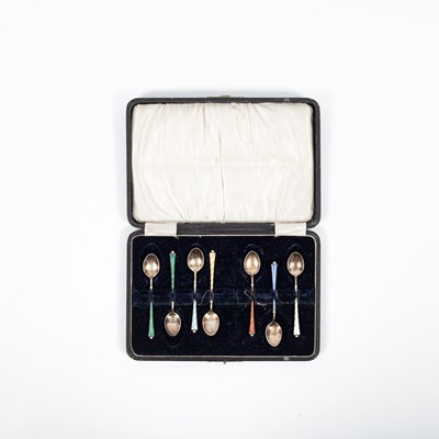 Lot 142 - A set of seven Danish silver and enamel demitasse spoons