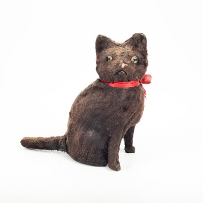 Lot 801 - A clockwork toy modelled as a black cat