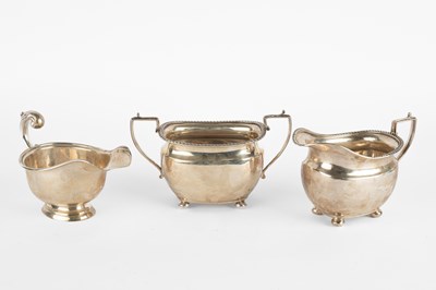 Lot 91 - A silver sugar basin and cream jug