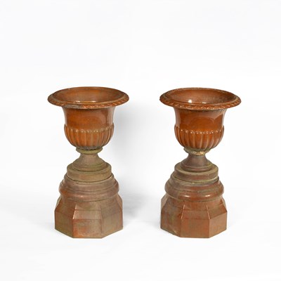 Lot 15 - A pair of Scottish salt glaze urns on plinths