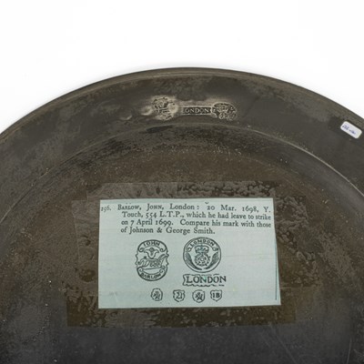 Lot 41 - An English pewter multiple reeded charger by John Barlow of London