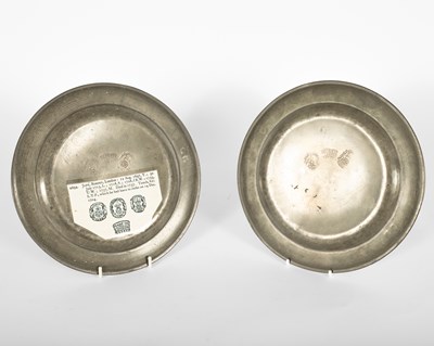 Lot 40 - A pair of English pewter reeded plates by Robert Jupe of London