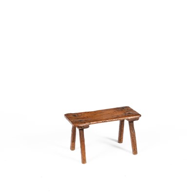 Lot 261 - A 19th Century pine milking stool