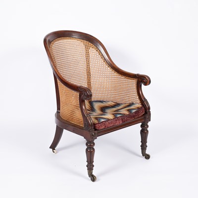 Lot 650 - A William IV mahogany caned bergère chair