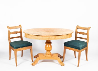 Lot 656 - An oval Biedermeier satin birch table