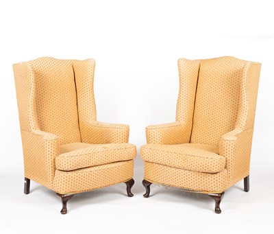 Lot 657 - A pair of 18th Century style wingback upholstered armchairs