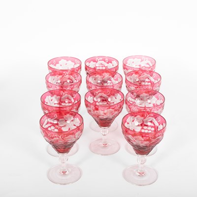 Lot 500 - A suite of cranberry stained glassware